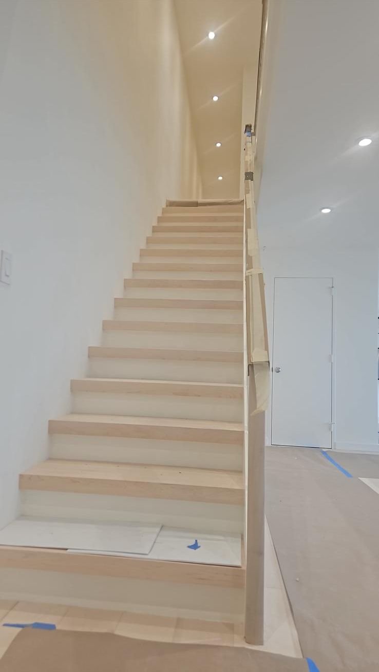 Staircase finished in a clean, light tone
