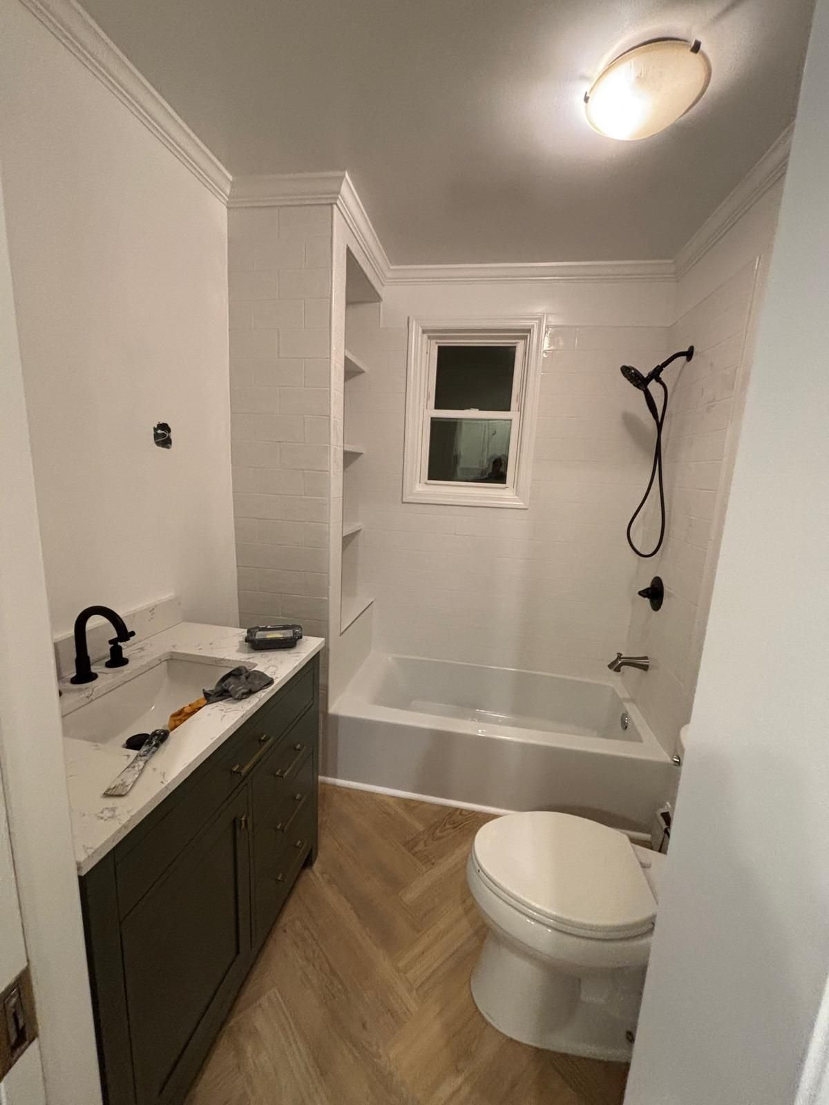 Bathroom finished: smooth walls and crisp crown molding