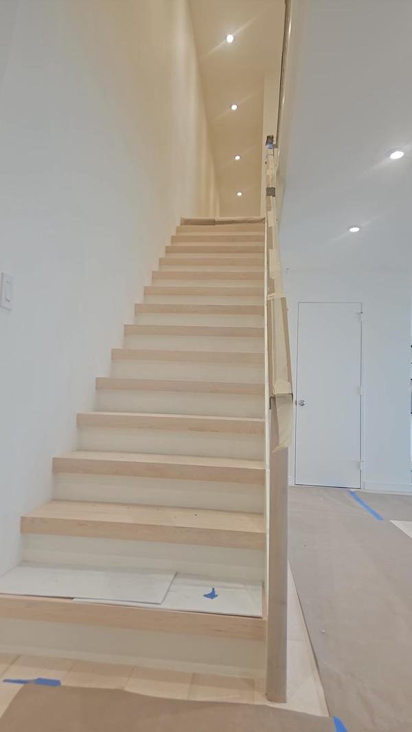 Staircase finished in a clean, light tone